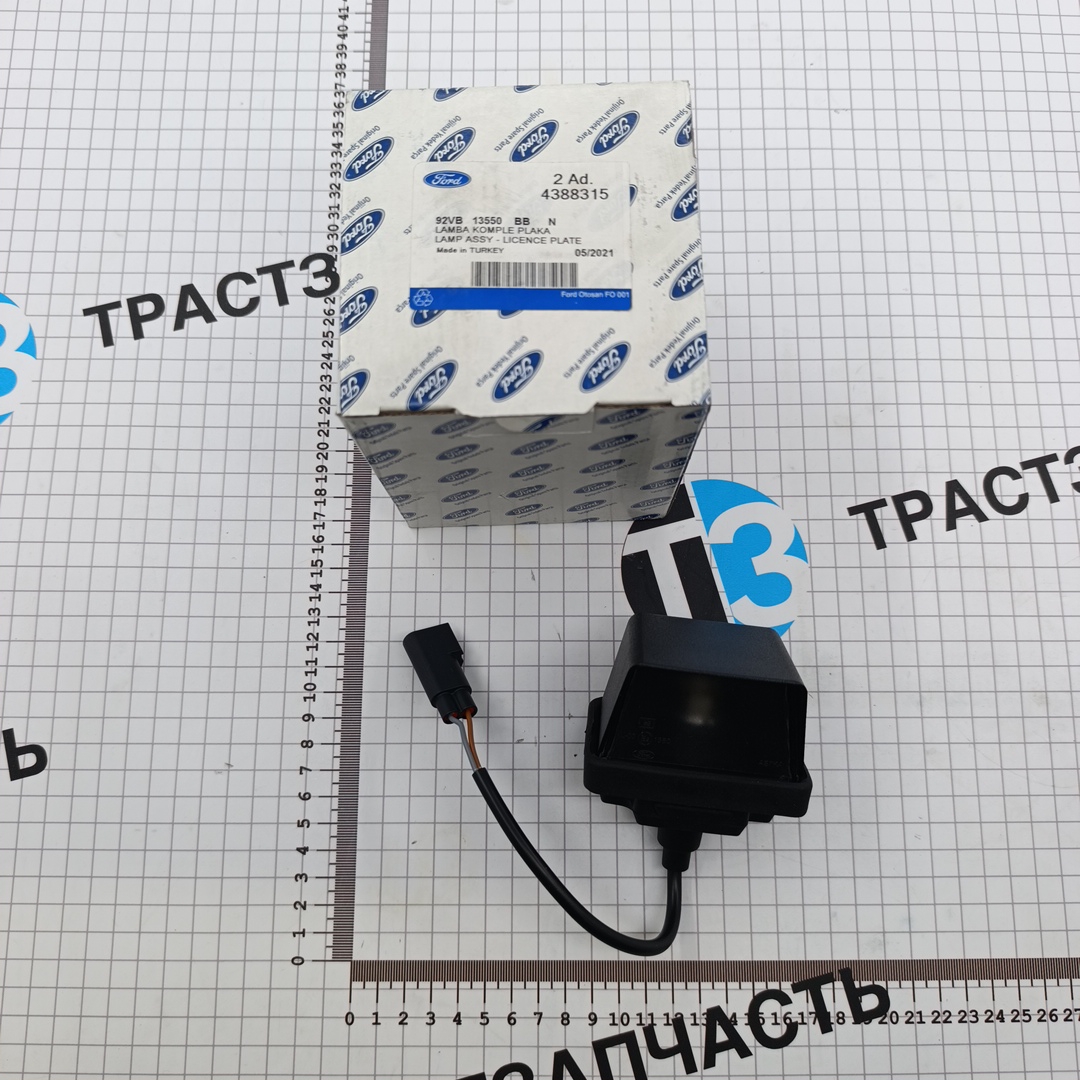 Фонарь номерного знака TR > 06 (все варианты с кузовом типа шасси) 92VB13550BB/4388315 OTOCAH - Миниатюра товара 1